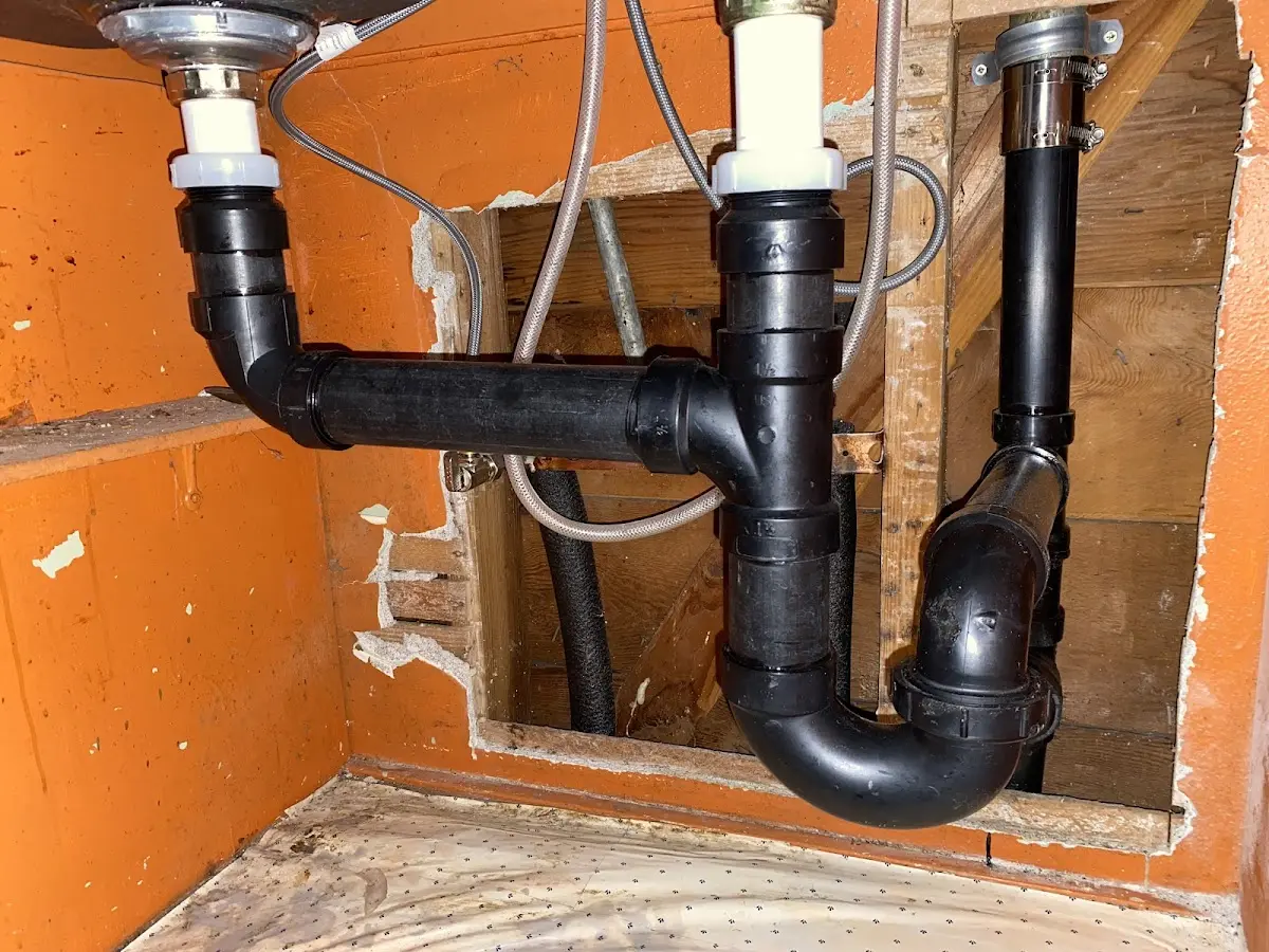 Professional Garbage Disposal Repair equipment and tools on the job in Chester